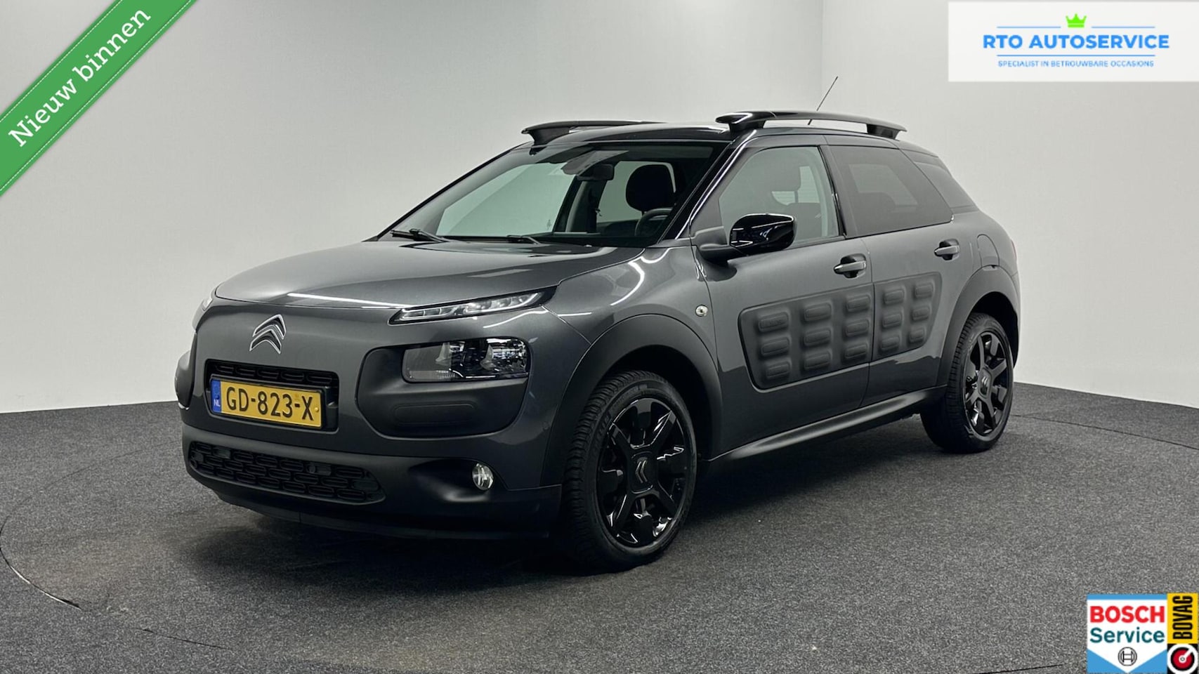 Citroën C4 Cactus - 1.2 PureTech Shine PANO NAVI TREKHAAK CRUISE. - AutoWereld.nl