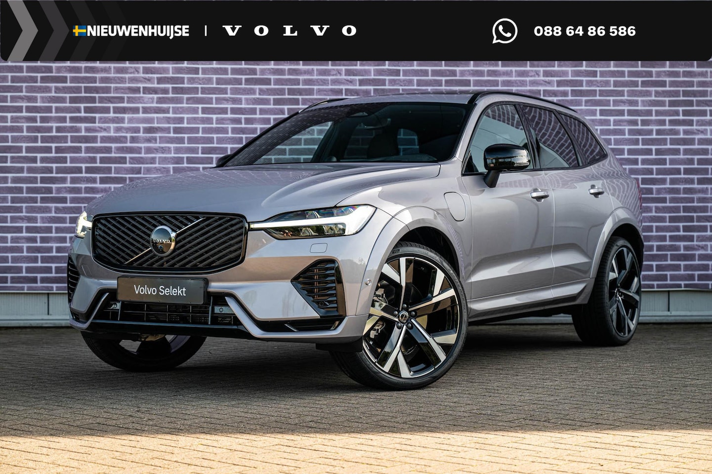 Volvo XC60 - 2.0 T8 Plug-in hybrid AWD Ultra Black Edition Executive | Luchtvering | 22" | Gelamineerd - AutoWereld.nl