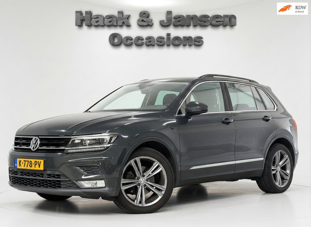 Volkswagen Tiguan - 2.0 TDI Comfortline DSG Navi Pdc Cruise - AutoWereld.nl