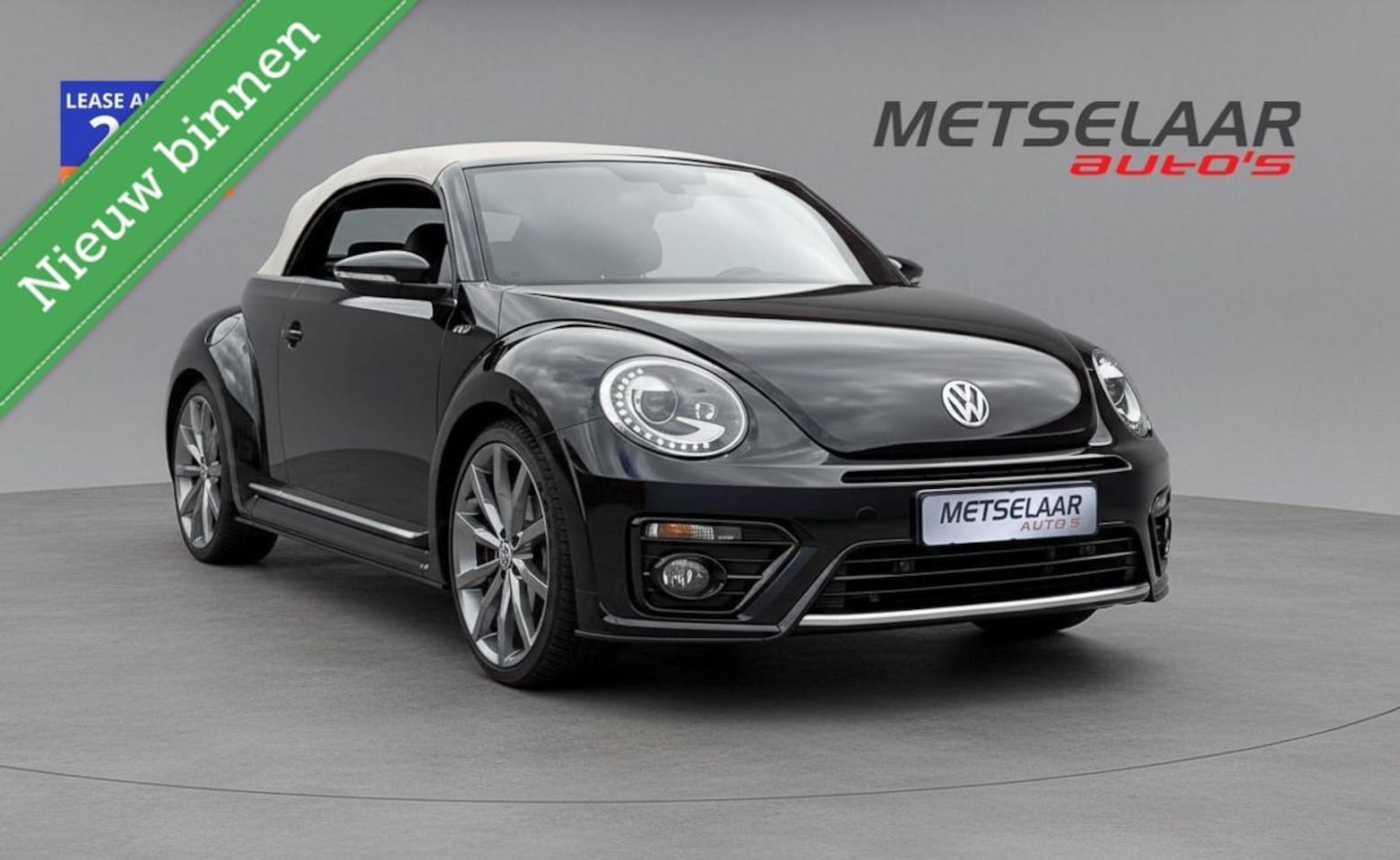 Volkswagen Beetle Cabriolet - 1.4 TSI Sport BlueMotion 1.4 TSI Sport BlueMotion - AutoWereld.nl