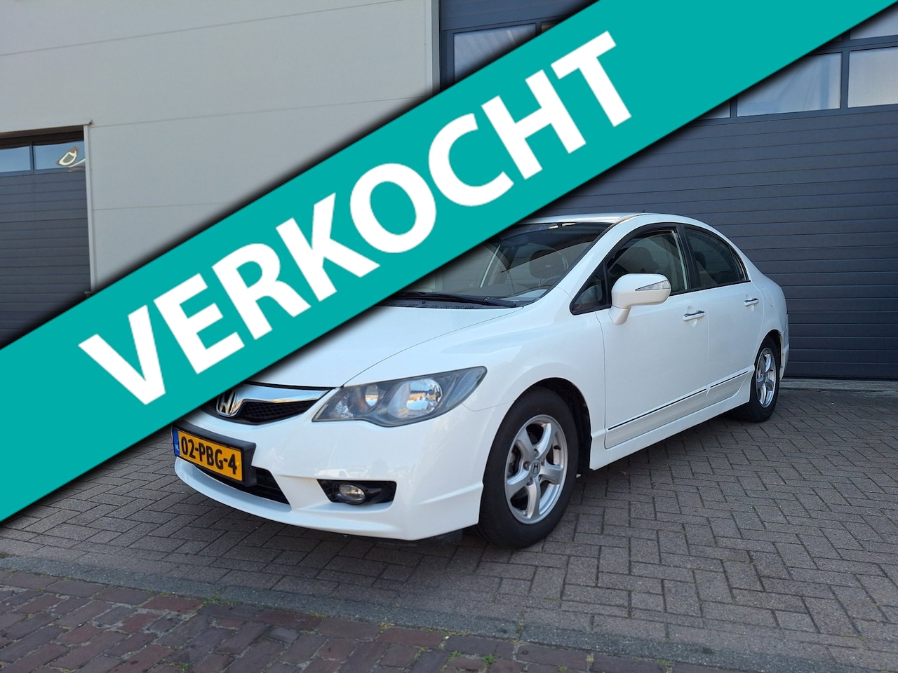 Honda Civic - | 1.3 Hybrid Elegance | Lage kilometerstand | Airco | Stoel verwarming | Cruise control | - AutoWereld.nl