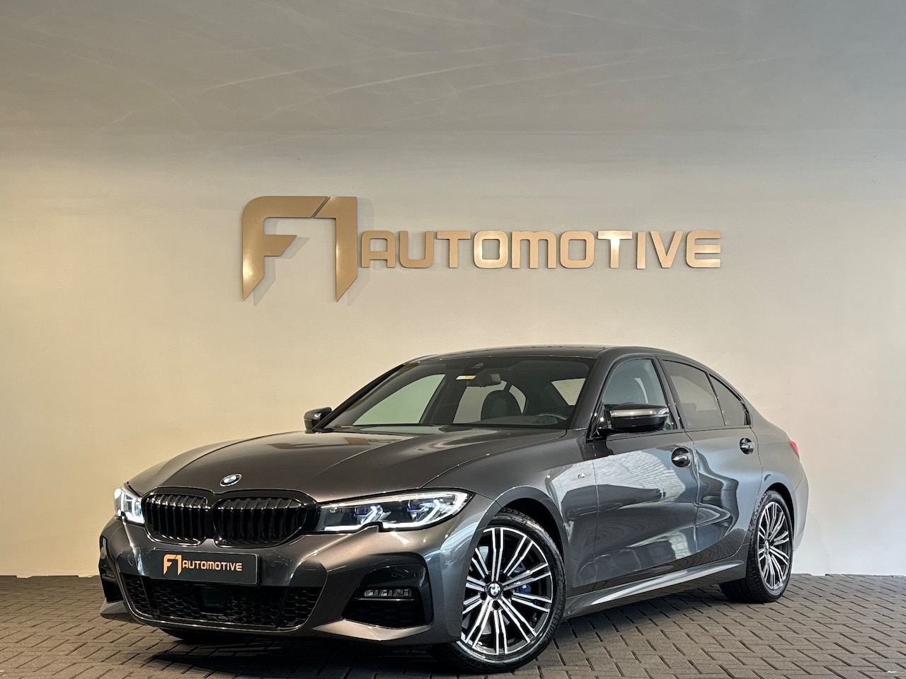 BMW 3-serie - 330i High Executive Laser|Stoelverwarming|Carplay|Sfeer - AutoWereld.nl