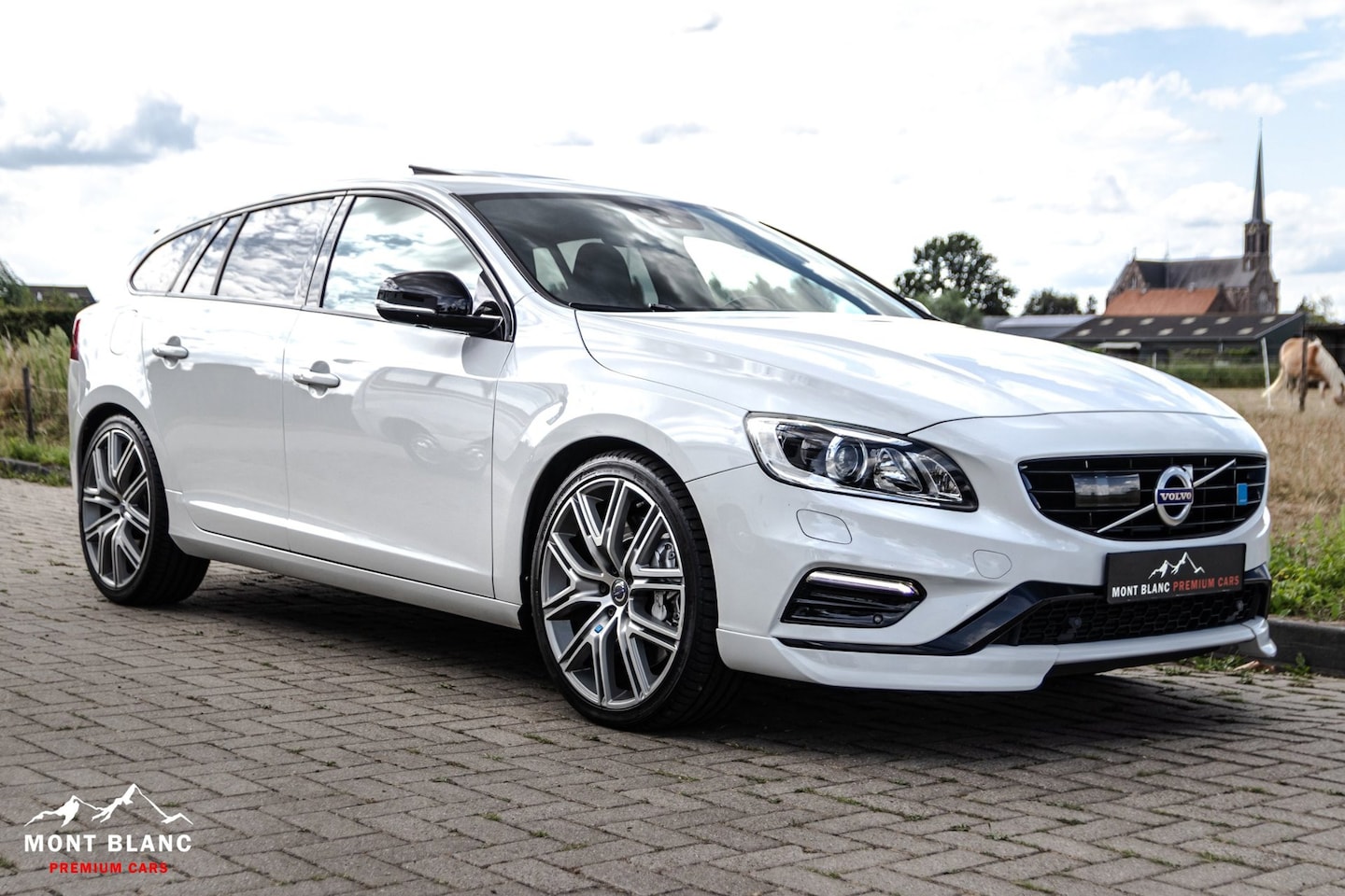 Volvo V60 - 2.0 T6 AWD R-Design|Polestar|367 PK|H/K|ACC|Schuif kant. dak - AutoWereld.nl