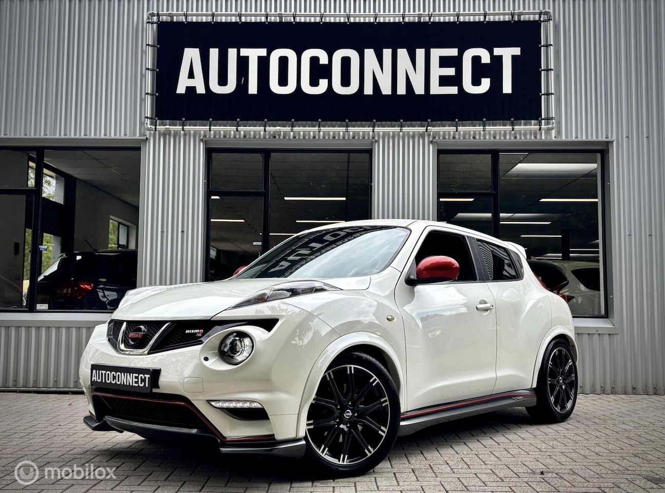 Nissan Juke - 1.6 Turbo NISMO. NAVI, CAMERA, CRUISE, STOELVERWARMING - AutoWereld.nl