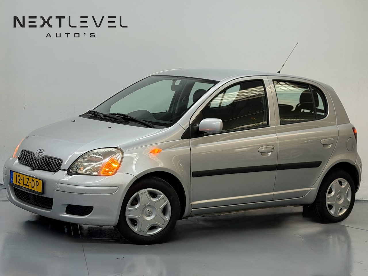 Toyota Yaris - 1.3 VVT-i Sol AUTOMAAT Airco NAP APK - AutoWereld.nl