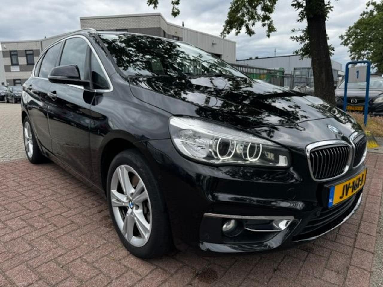 BMW 2-serie Active Tourer - 225xe Plugin Hybride Centennial High Executive Automaat Airco/ECC,Navigatie,Leder,HUD - AutoWereld.nl