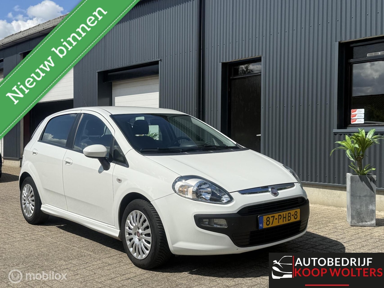 Fiat Punto Evo - 1.3 M-Jet Dynamic 63.000KM - AutoWereld.nl