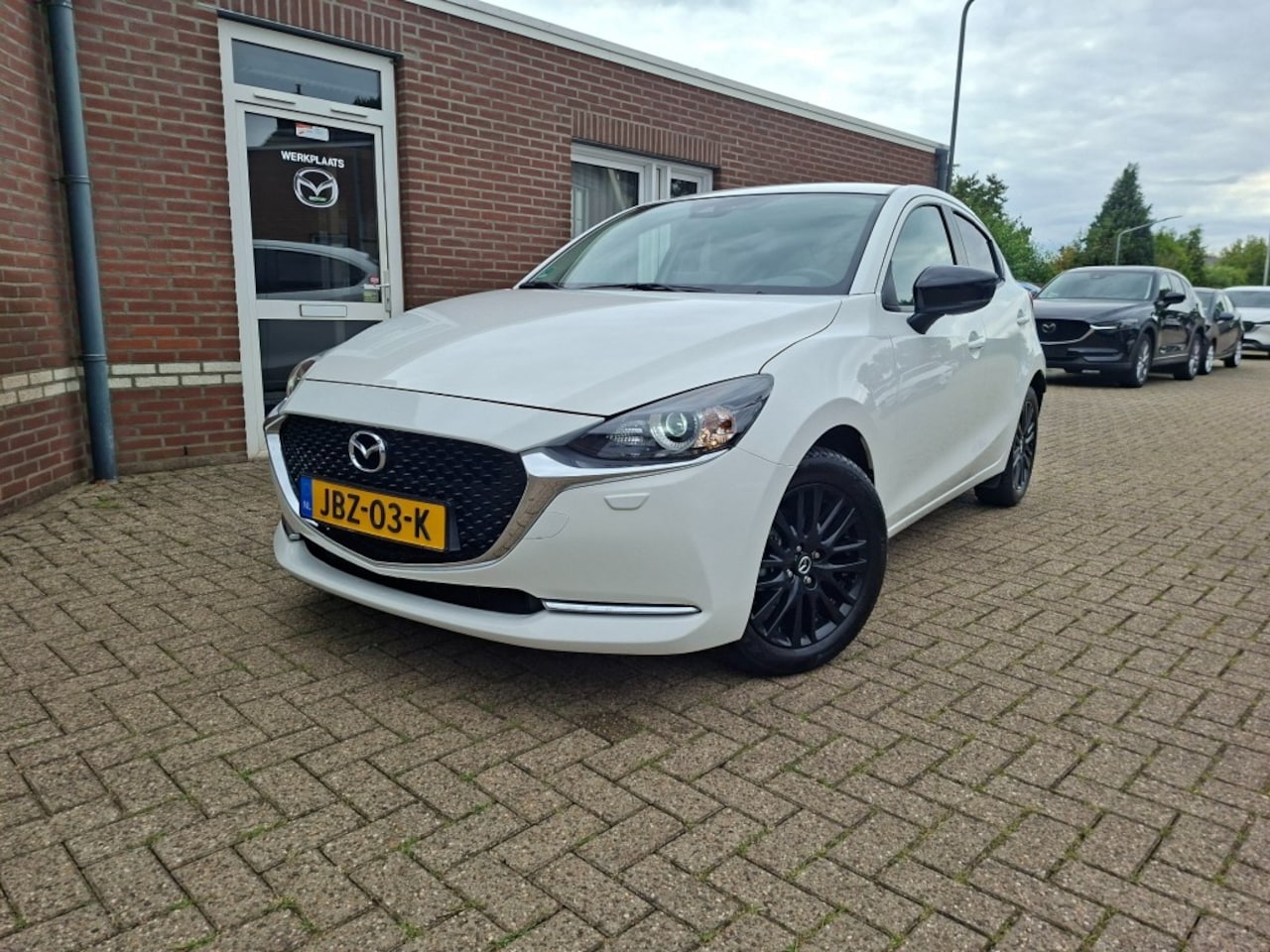 Mazda 2 - 1.5 SKYACT-G LUXURY AUTOMAAT / CAMERA / CARPLAY / CRUISE / STOELVERW - AutoWereld.nl