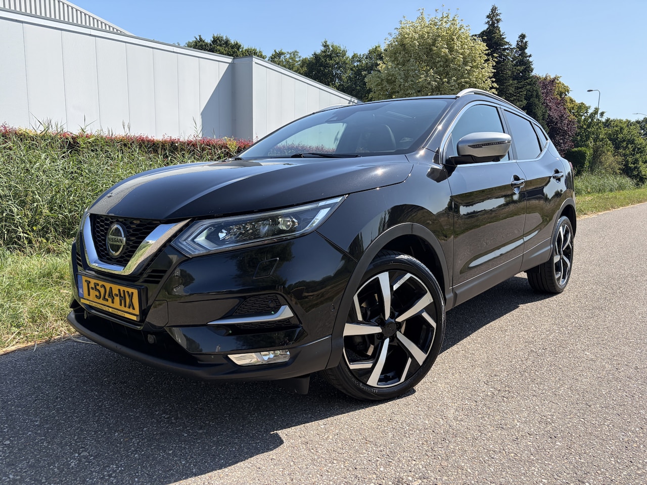 Nissan Qashqai - 1.2 Tekna / LEER / MEMORY / PANORAMADAK / CRUISE / NAVI - AutoWereld.nl