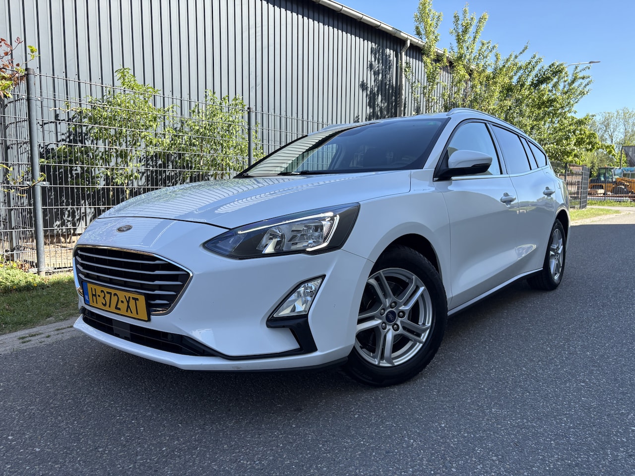 Ford Focus Wagon - 1.0 EcoBoost Trend Edition Business / NAVI / AIRCO / CRUISE - AutoWereld.nl