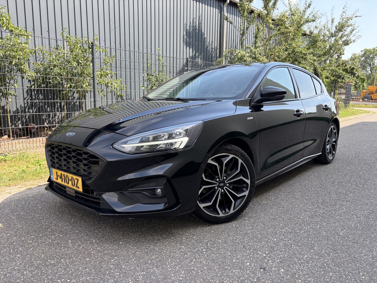 Ford Focus - 1.0 EcoBoost Titanium Business / AUTOMAAT / NAVI / CRUISE / 135dkm! - AutoWereld.nl