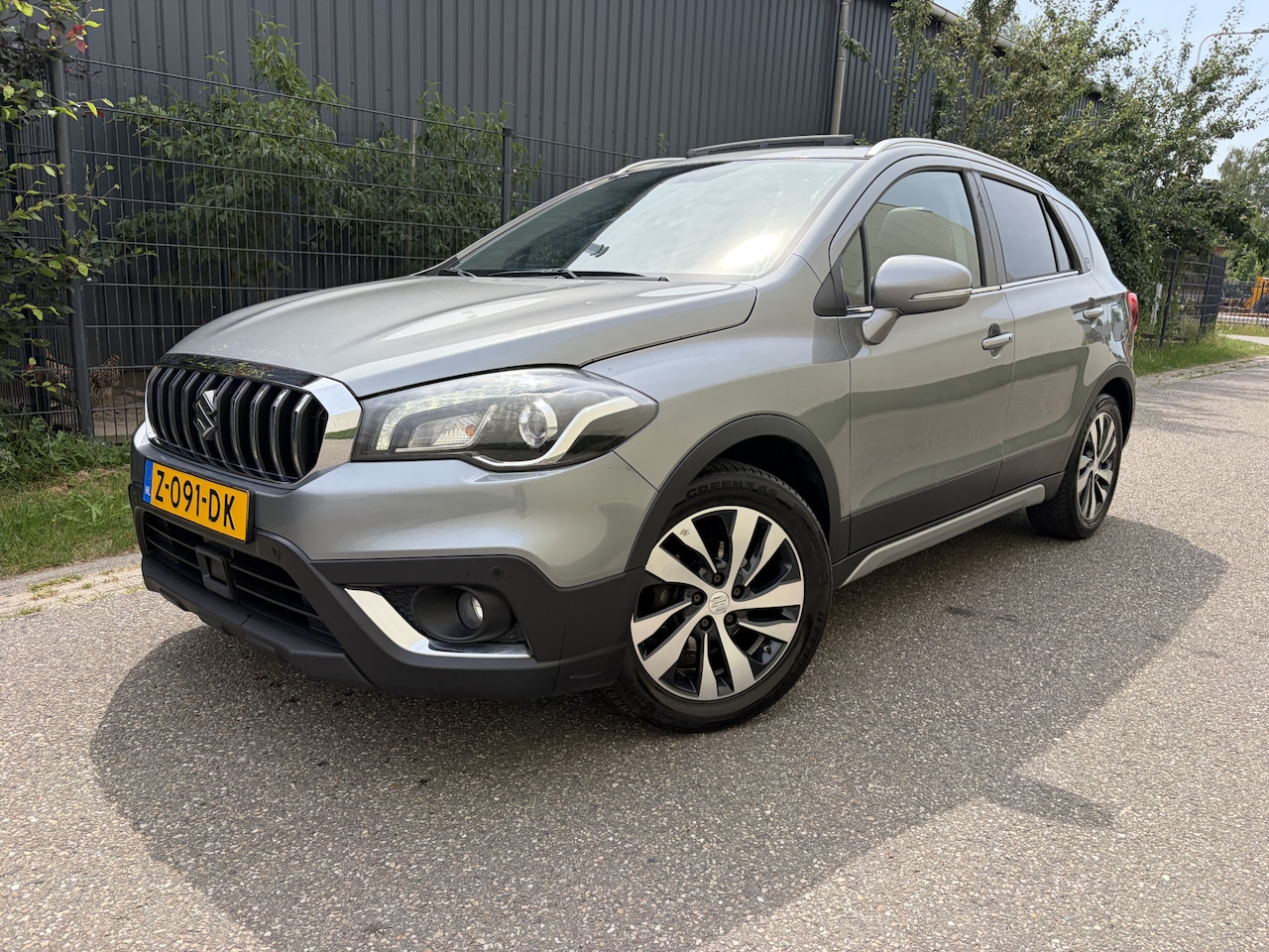 Suzuki S-Cross - 1.4 Boosterjet AllGrip Stijl / AUTOMAAT / LEER / PANORAMADAK / TREKHAAK / LPG-G3 - AutoWereld.nl