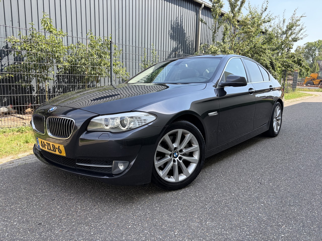 BMW 5-serie - 520i High Executive / AUTOMAAT / NAVI / CRUISE / LEER - AutoWereld.nl