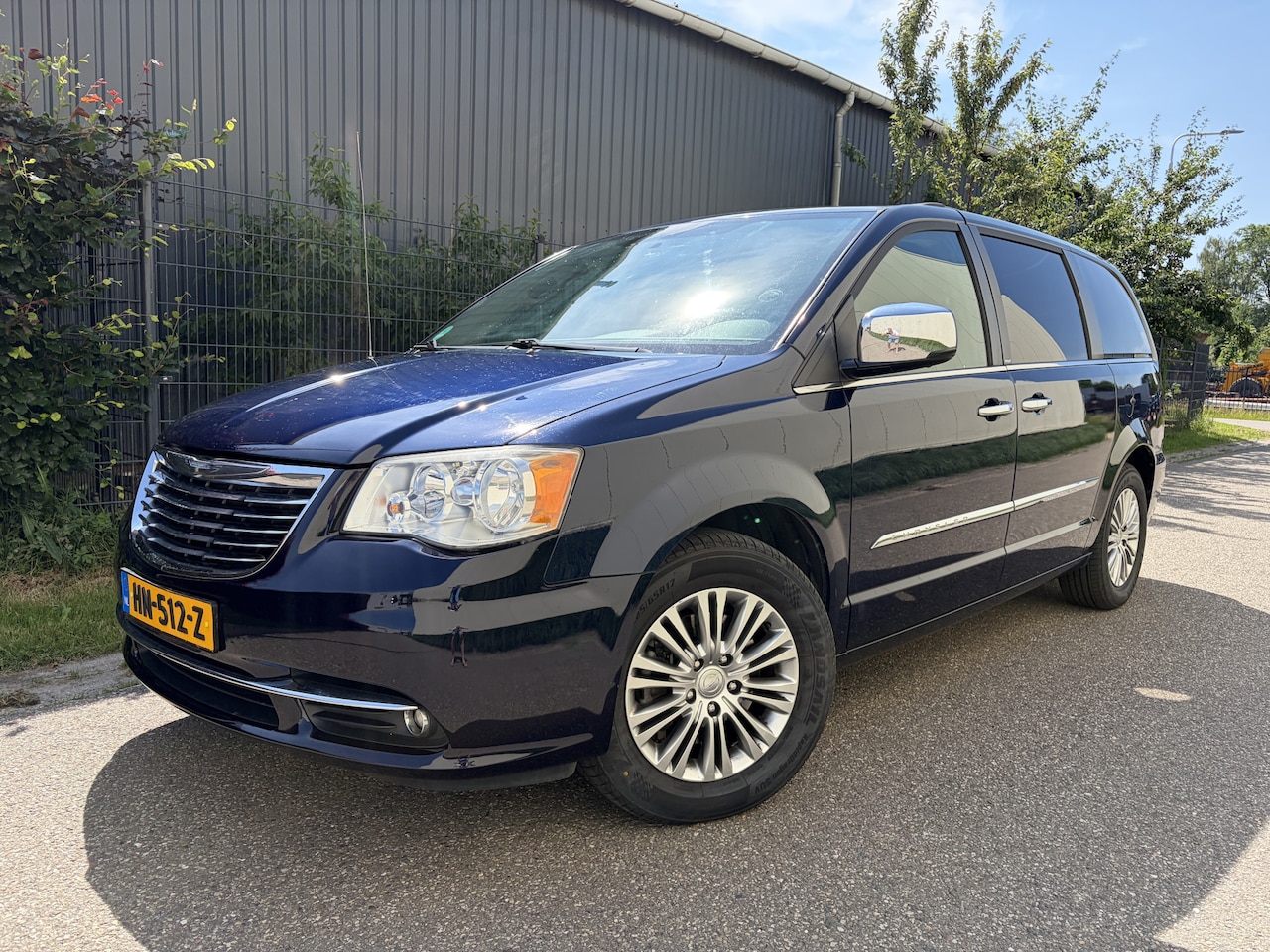 Chrysler Town & Country - 3.6 V6 / AUTOMAAT / STOW N GO / 7 PERSOONS / DVD / NAVI / CRUISE - AutoWereld.nl