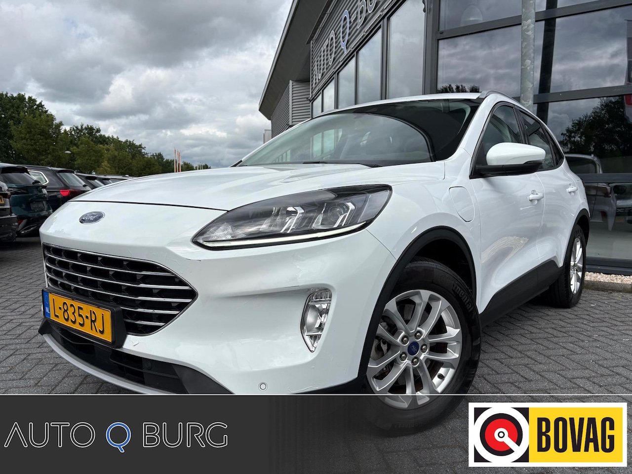 Ford Kuga - 2.5 PHEV Titanium | Camera | Cruise | Climate | Camera | Navi | LED | LMV | Dealer Onderho - AutoWereld.nl