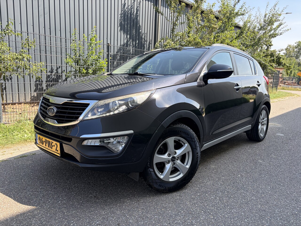 Kia Sportage - 2.0 X-ecutive Plus Pack / NAVI / AIRCO ECC / CRUISE / PANORAMADAK - AutoWereld.nl