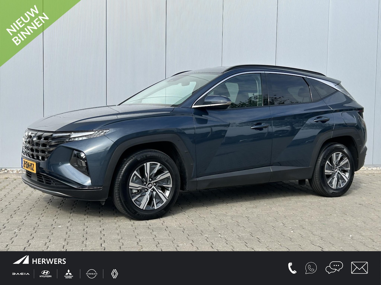 Hyundai Tucson - 1.6 T-GDI HEV Comfort / Trekhaak Vast 1650KG Trekgewicht / Navigatie / Cruise Control Adap - AutoWereld.nl
