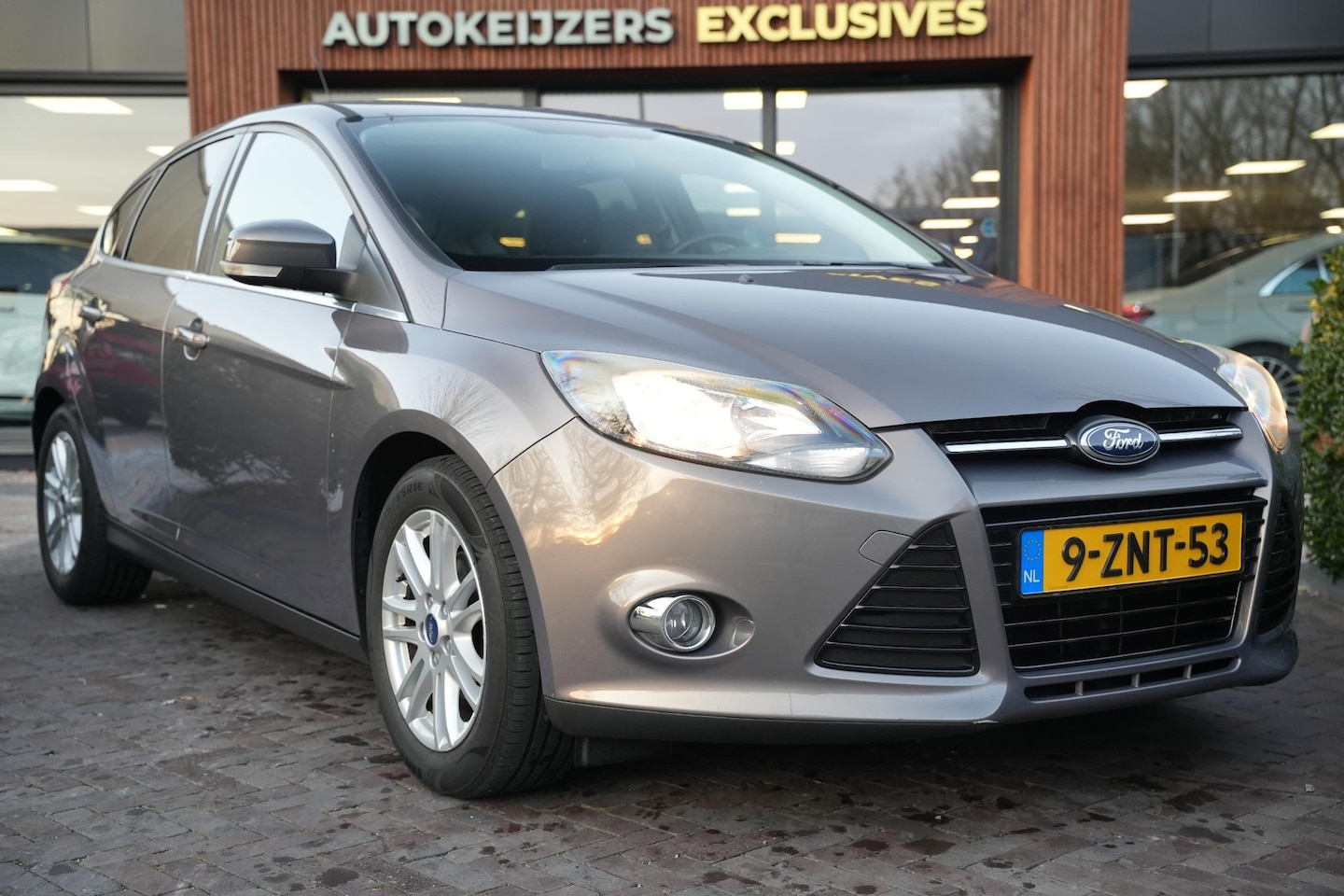 Ford Focus - 1.0 EcoBoost Titanium Keyless Cruise Clima Trekhaak - AutoWereld.nl
