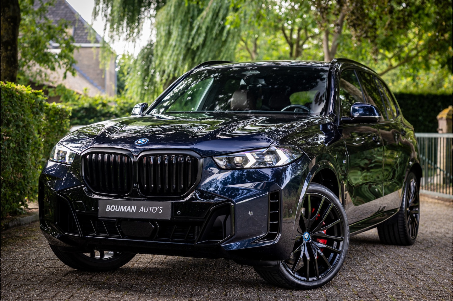 BMW X5 - xDrive50e M Sport Pro 22" Carbon Harman Kardon Iconic Glow Head Up - AutoWereld.nl
