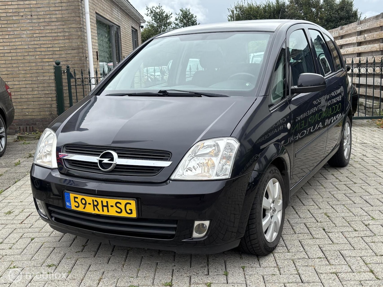 Opel Meriva - 1.6-16V Cosmo | airco | cruise | apk lang ! - AutoWereld.nl