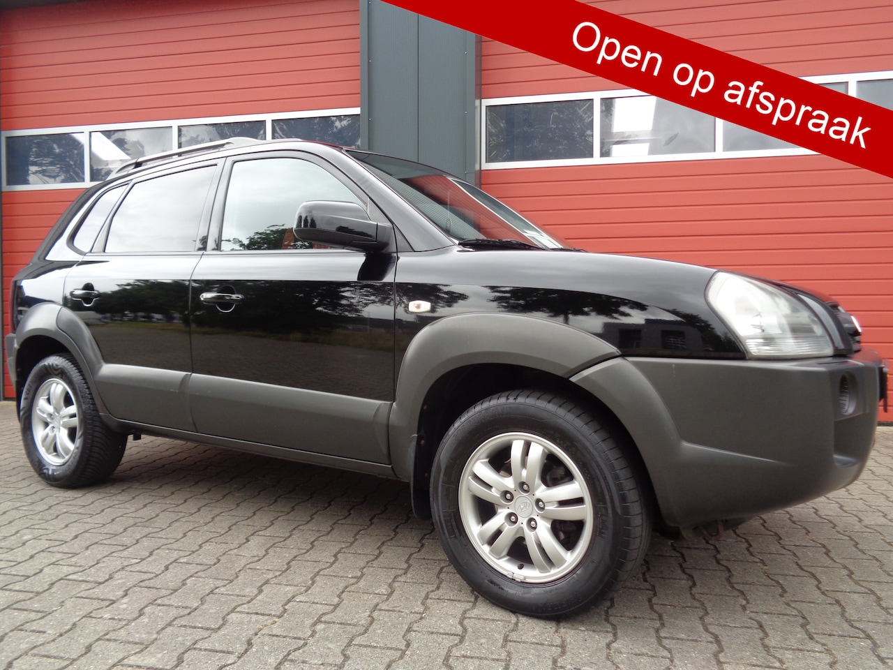 Hyundai Tucson - 2.0i Style 142PK Clima Cruise LMV Trekhaak NL-Auto Hoge-Instap/Zit - AutoWereld.nl