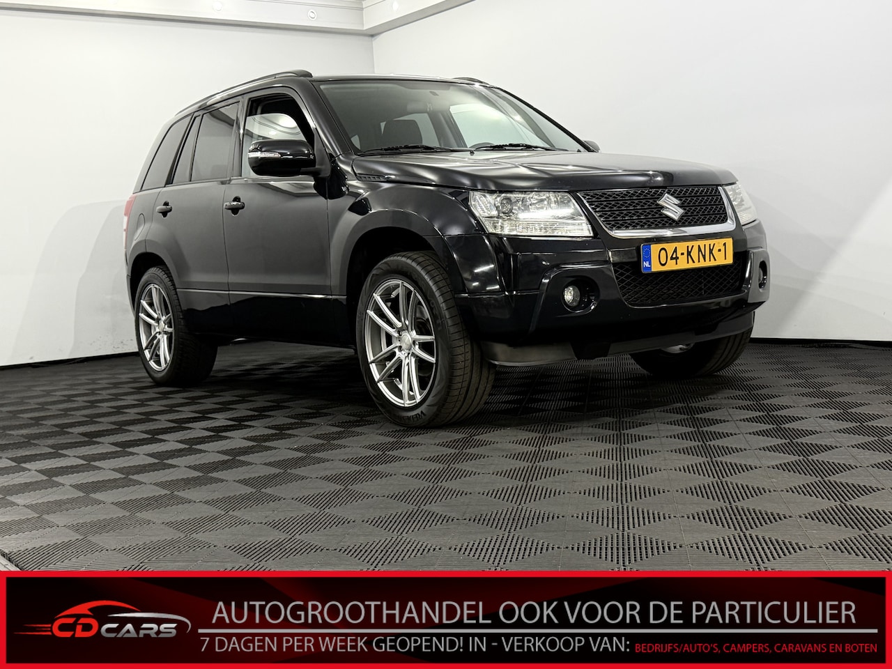 Suzuki Grand Vitara - 2.4 Exclusive Clima, Cruise control, Parkeersensoren, Sportief velgen, Mistlamp, Radio, Re - AutoWereld.nl