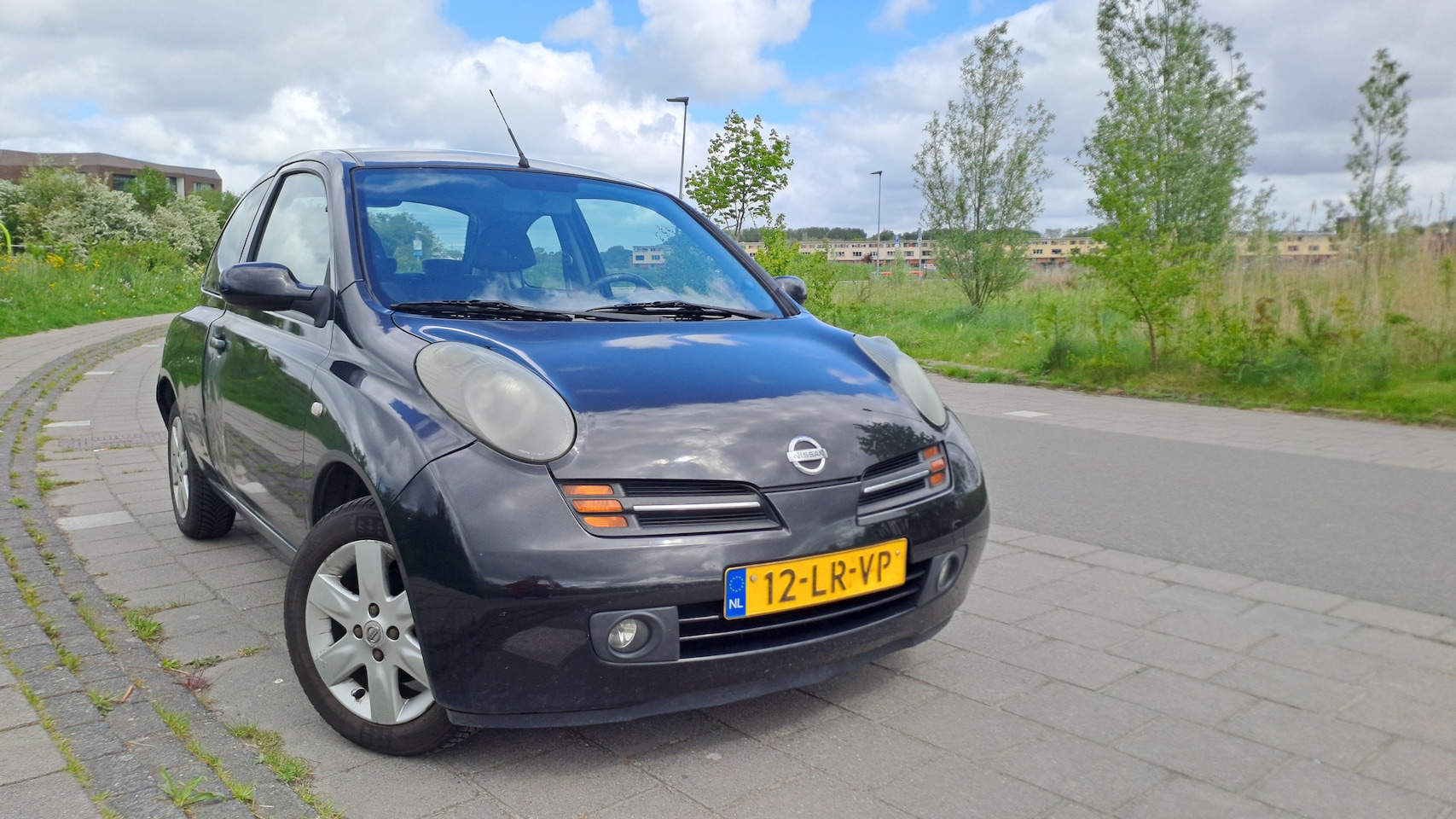 Nissan Micra - 1.4 Tekna - AutoWereld.nl