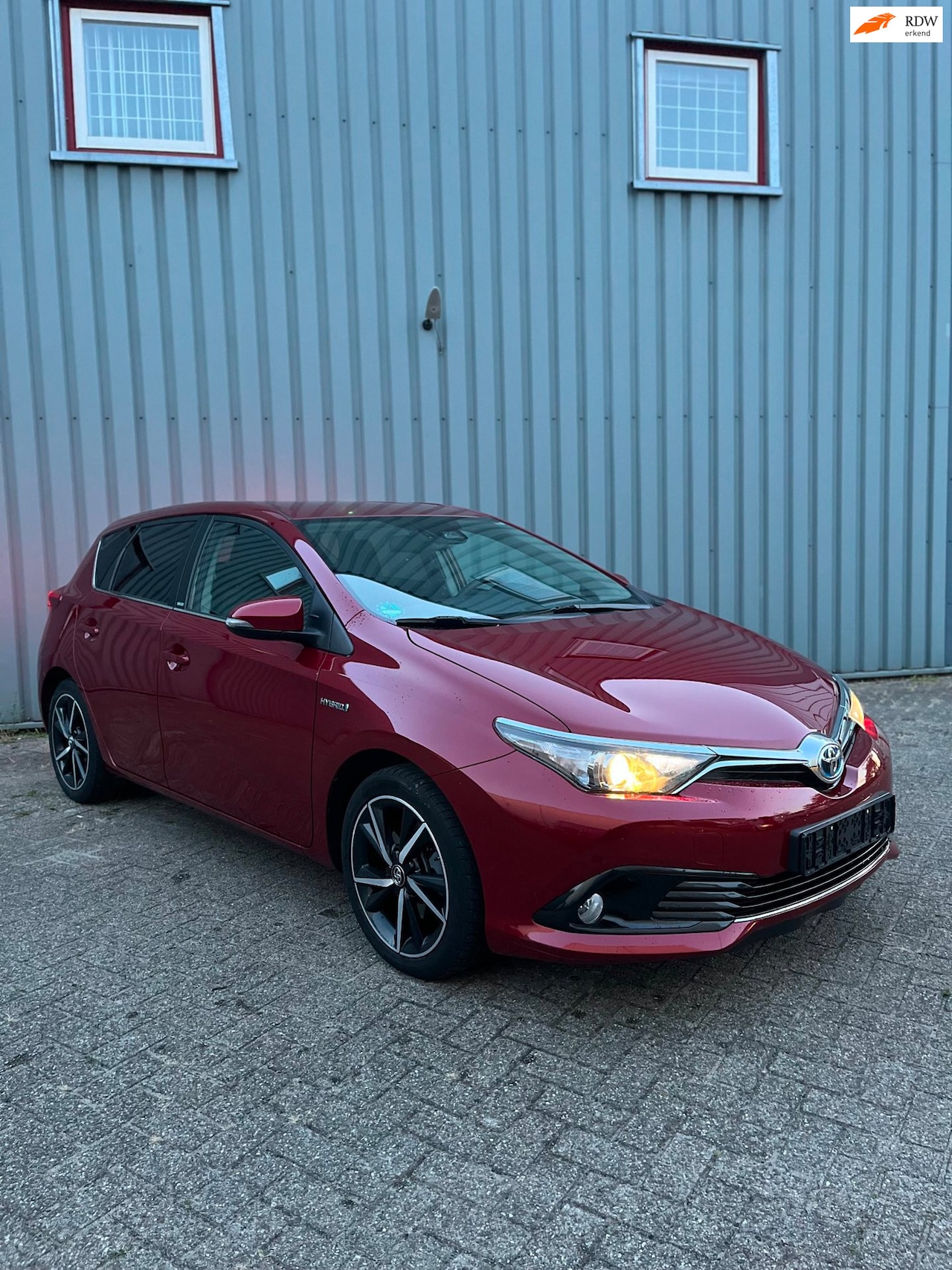 Toyota Auris - 1.8 Hybrid Executive zeer nette auto - AutoWereld.nl