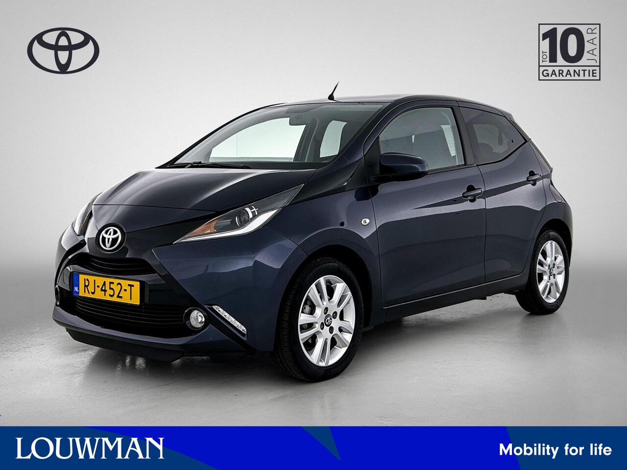 Toyota Aygo - 1.0 VVT-i x-joy automaat | Dealer onderhouden | Climate control | DAB | Navigatie | Achter - AutoWereld.nl