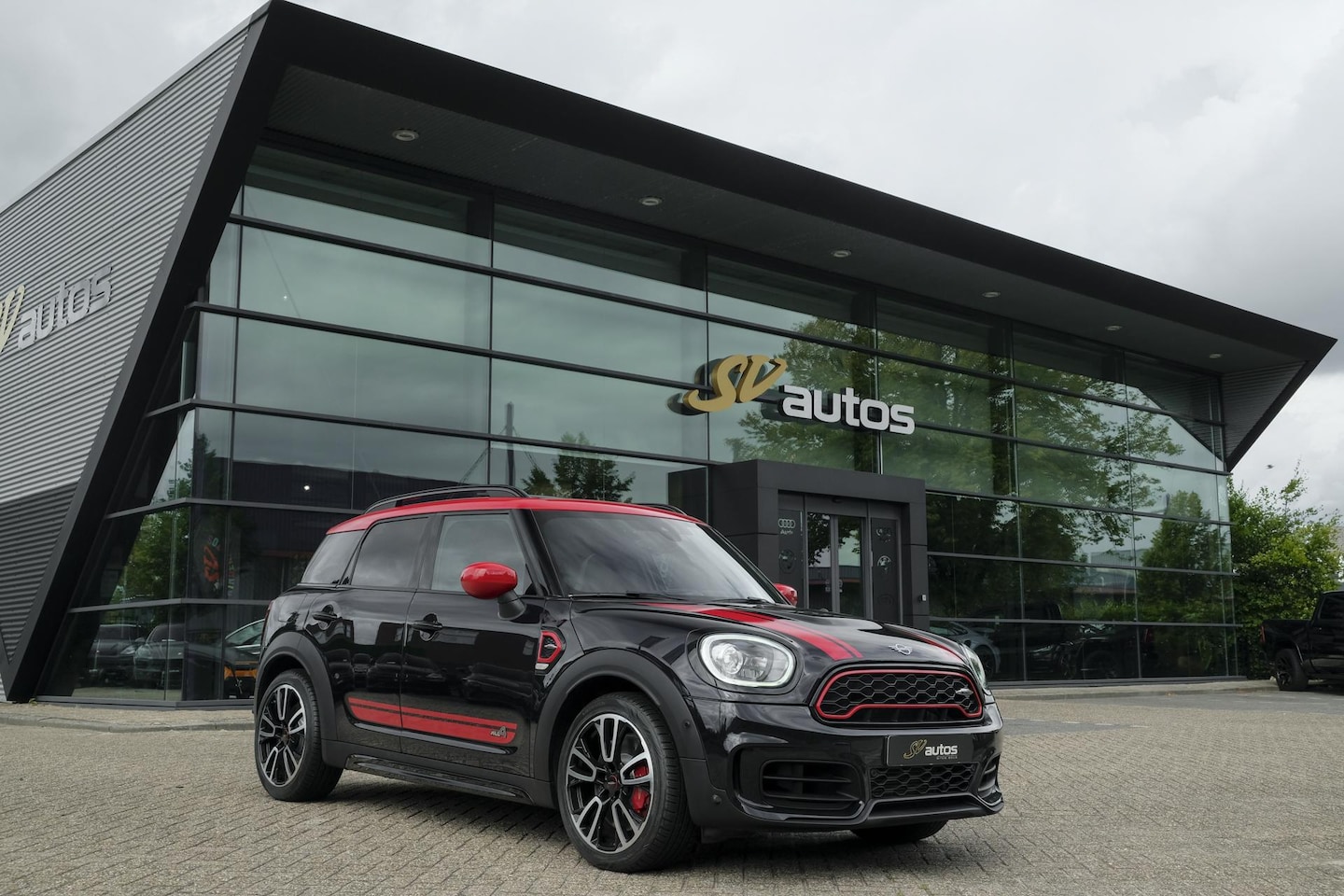 MINI Countryman - 2.0 John Cooper Works 306pk ALL4 JCW Panoramadak Harman/Kardon Camera DAB NLauto NAP - AutoWereld.nl