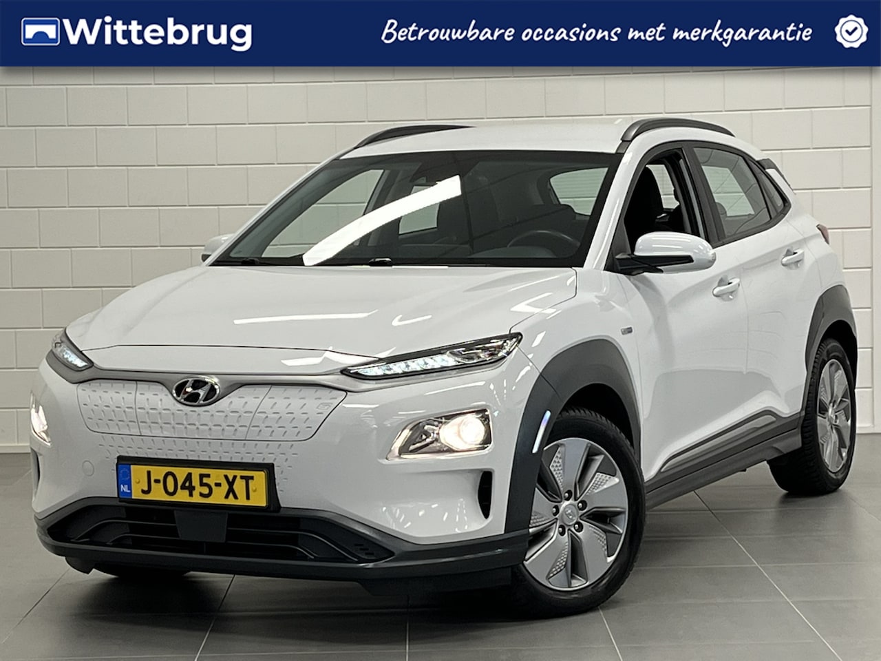 Hyundai Kona Electric - EV Comfort 64 kWh 3-FASE LADEN | LONG RANGE | NAVIGATIE - AutoWereld.nl