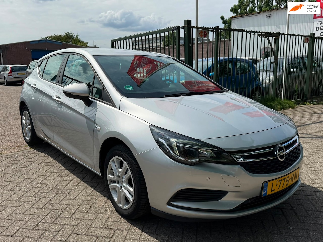 Opel Astra - 1.0 Turbo 120 Jaar Edition Start stop 1e eigenaar dealer onderhouden navigatie cruis contr - AutoWereld.nl