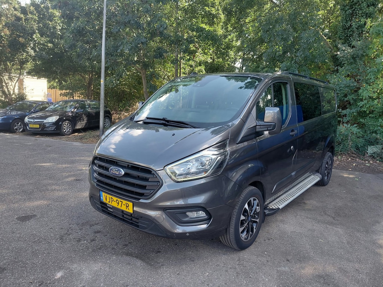 Ford Transit Custom - 300 2.0 TDCI L2H1 Limited DC 300 2.0 TDCI L2H1 Limited DC - AutoWereld.nl