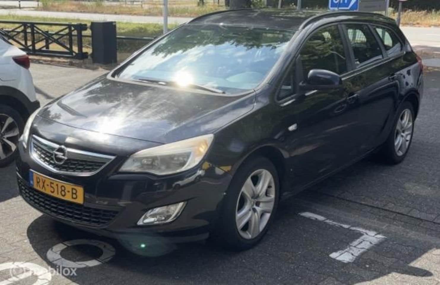Opel Astra Sports Tourer - 1.4 Cosmo 1.4 Cosmo - AutoWereld.nl