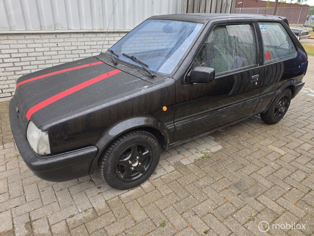 Nissan Micra - 1.2 LX 2 jaar apk - AutoWereld.nl