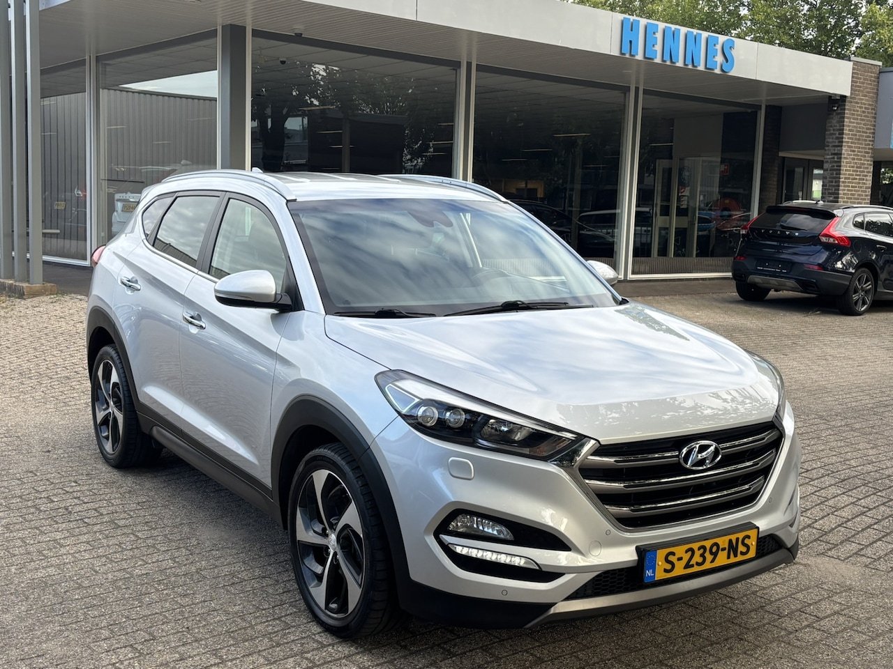 Hyundai Tucson - 1.6 T-GDi Comfort 4WD Stoel+stuurwielverwarming Xenon PDC camera - AutoWereld.nl