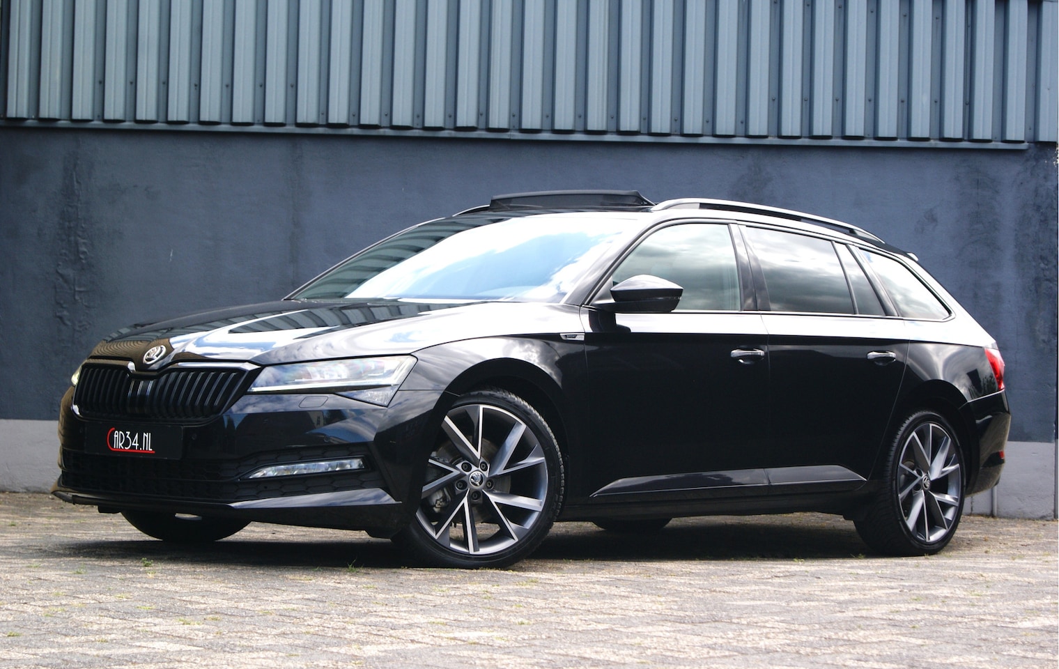 Skoda Superb - 2.0TFSI 190PK Sportline DSG Panoramdak/Canton/ACC/Memory/Carplay/Android - AutoWereld.nl