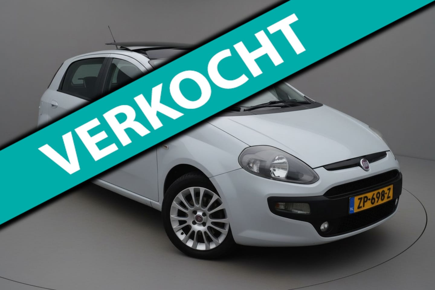 Fiat Punto Evo - 1.4-16V|Clima|Panorama|Trekhaak - AutoWereld.nl