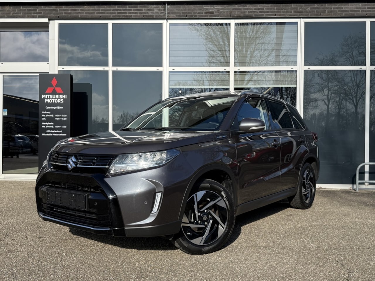 Suzuki Vitara - 1.4 B.jet Style Smart Hybrid | Panoramadak | All Seasons - AutoWereld.nl