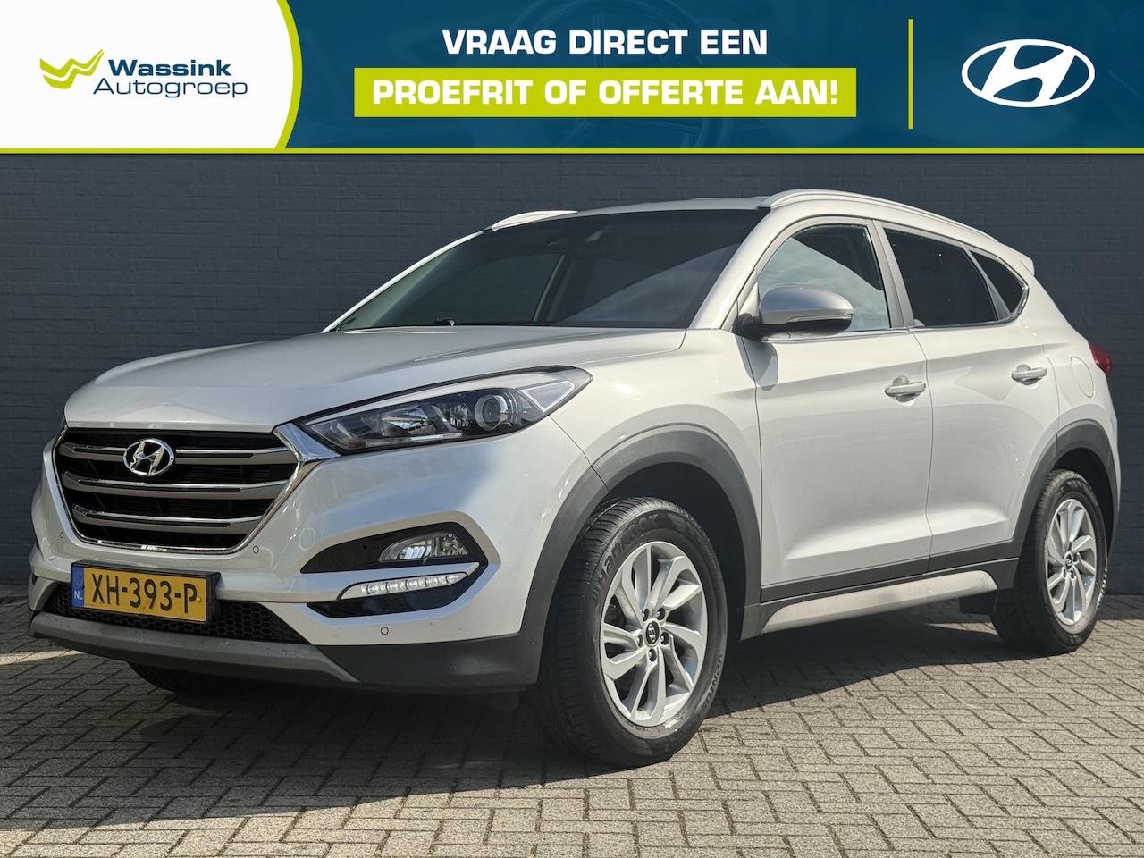 Hyundai Tucson - 1.6 GDi Comfort Navigatie | Cruise Control | Stoelverwaming | Achteruitrijcamera | Parkeer - AutoWereld.nl