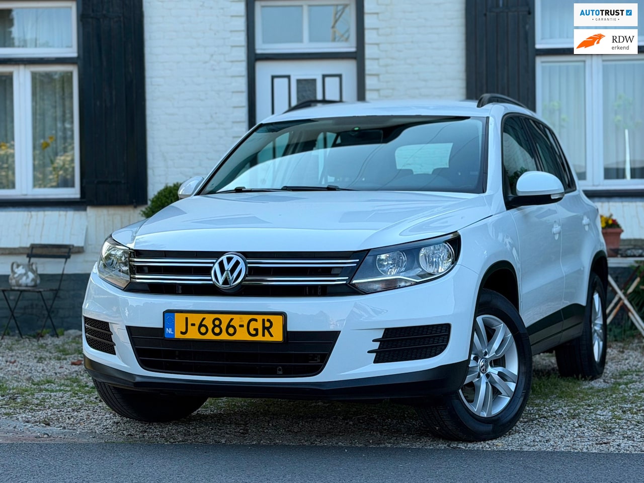 Volkswagen Tiguan - 2.0 TSI Sport&Style 4Motion|Automaat|Trekhaak|LMV| - AutoWereld.nl