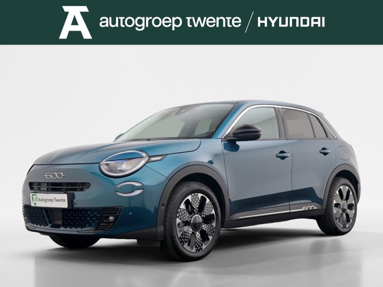 Fiat 600e - La Prima 54 kWh | Navigatie | Stoelverwarming | Creme leder - AutoWereld.nl