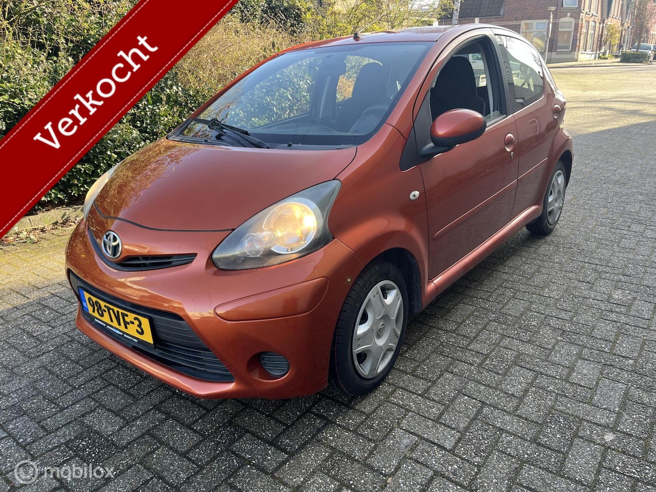 Toyota Aygo - 1.0 VVT-i Comfort Orange 1.0 VVT-i Comfort Orange - AutoWereld.nl