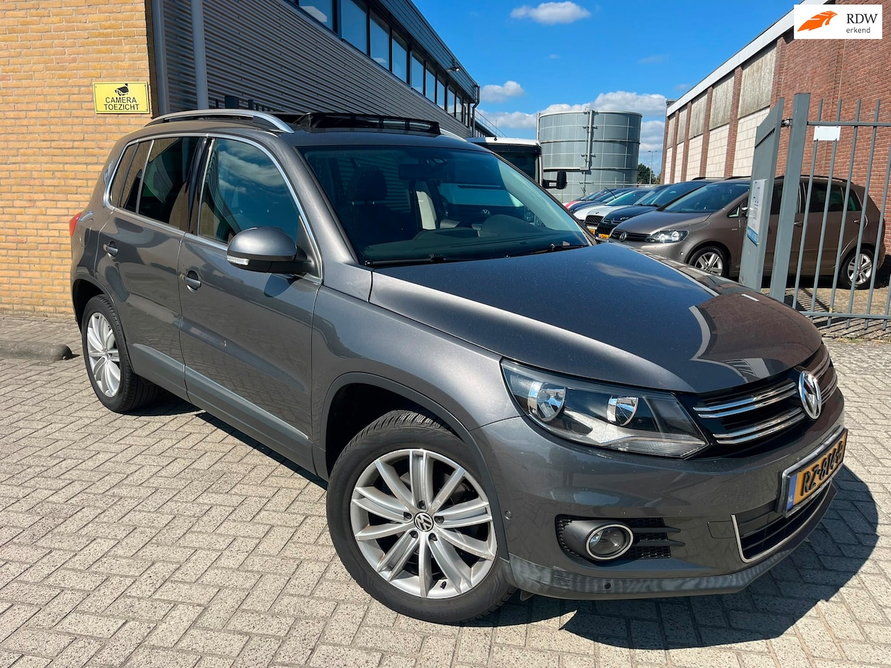 Volkswagen Tiguan - 1.4 TSI Sport&Style|160pk|Pano|Airco|Cruise|Alcantara| - AutoWereld.nl