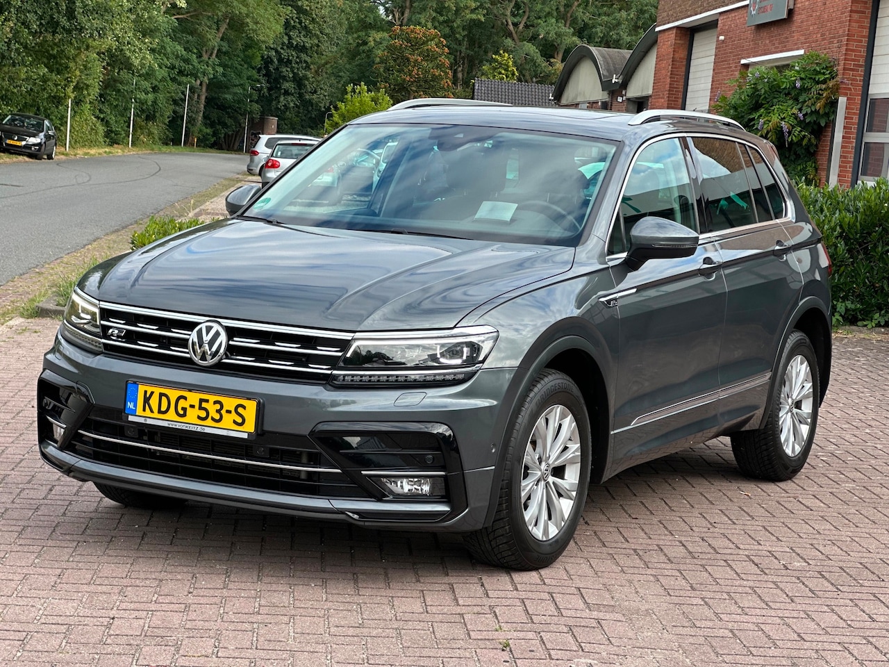 Volkswagen Tiguan - 2.0 TSI 4Motion Highline Business R 2.0 TSI 4Motion Highline Business R - AutoWereld.nl