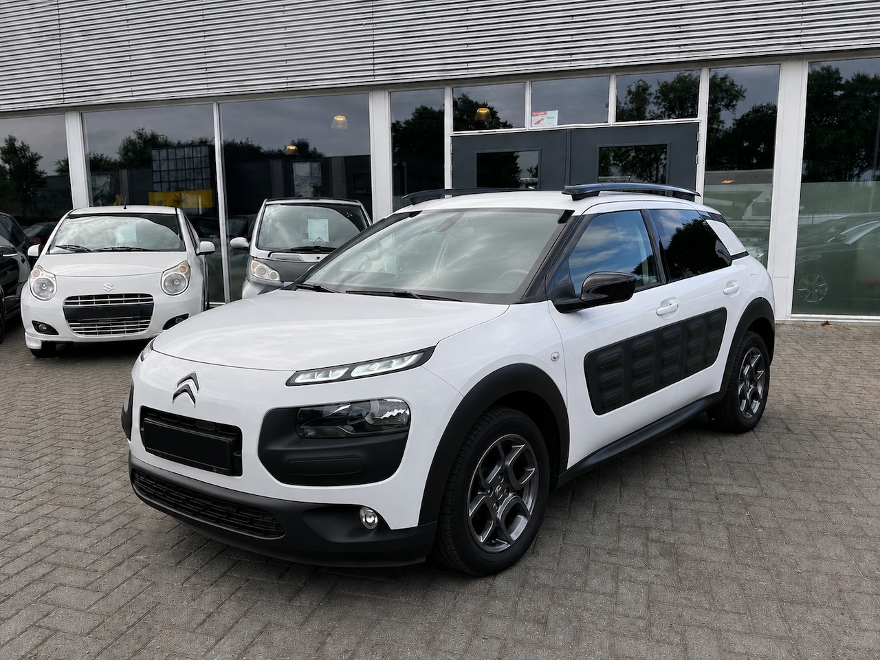 Citroën C4 Cactus - 1.2 PureTech Business Plus/Panodak/Navigatie/Lichtmetaal/Dealer onderhouden!!! - AutoWereld.nl