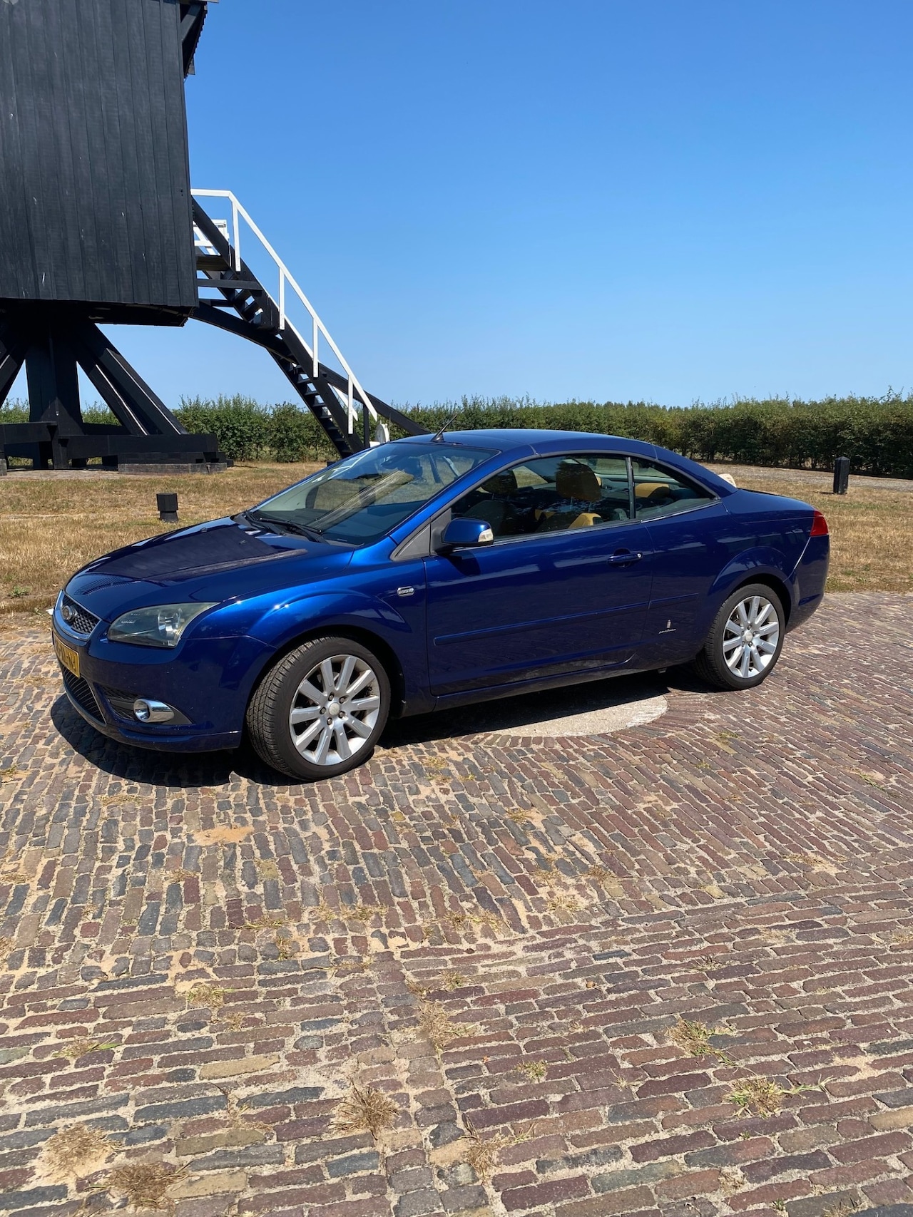 Ford Focus Coupé-Cabriolet - 2.0-16V Titanium Origineel NL Ford Focus CC hardtop cabriolet - AutoWereld.nl