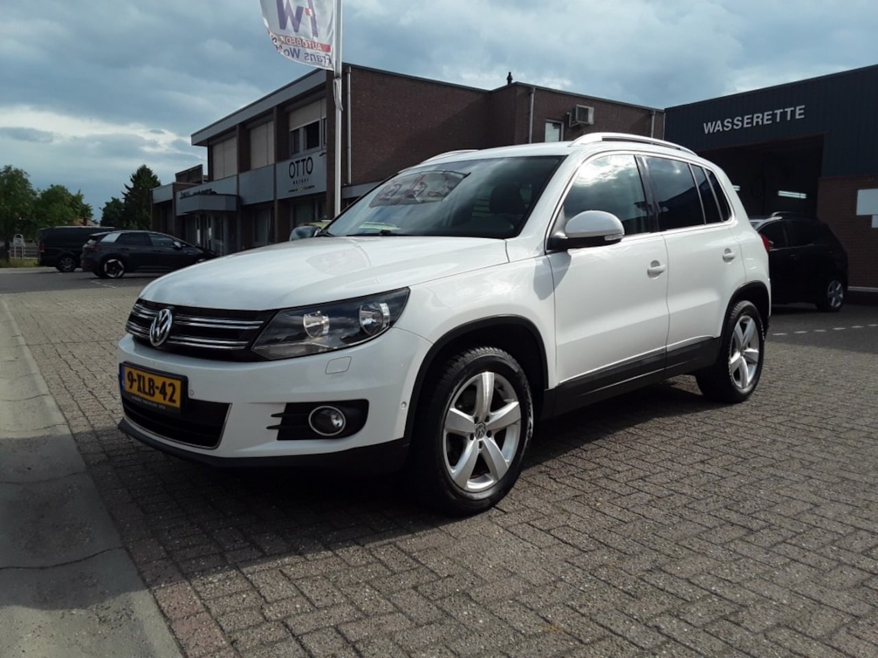 Volkswagen Tiguan - 1.4 TSI Sport&Style 1.4 TSI SPORTenSTYLE - AutoWereld.nl