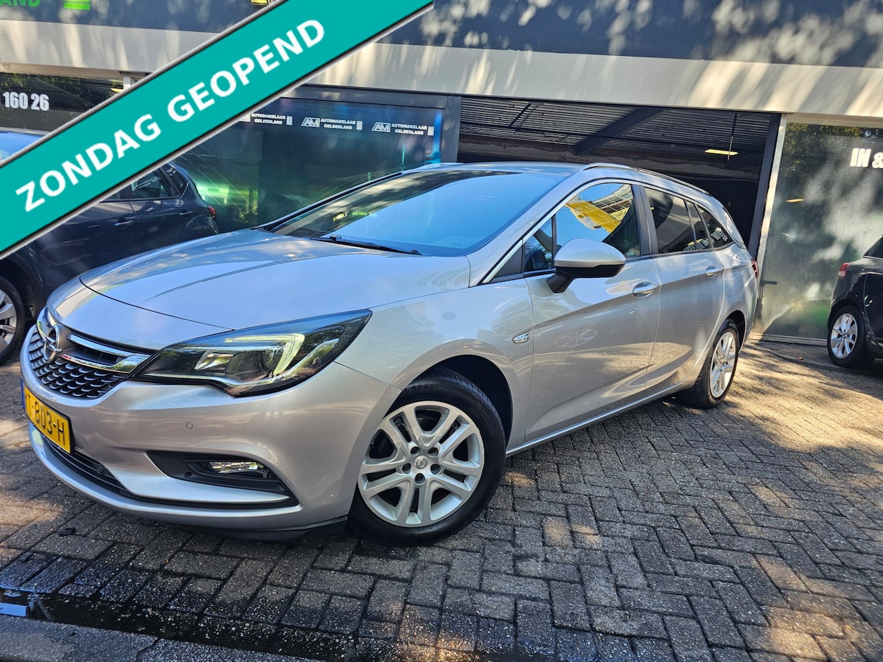 Opel Astra Sports Tourer - 1.0 Business+ | 2E EIGENAAR | NW APK | STOELVERWARMING | TREKHAAK | LMV | - AutoWereld.nl