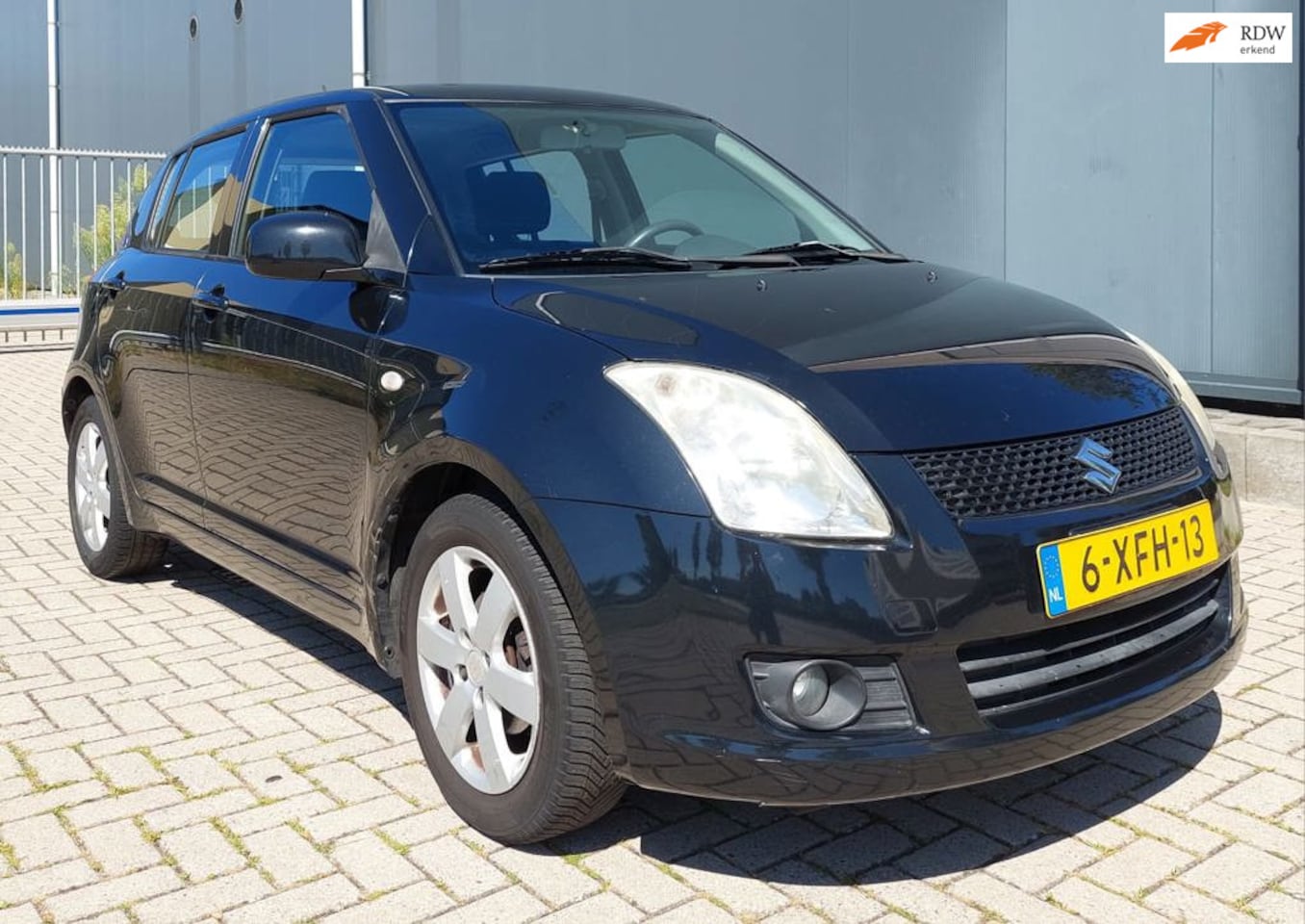 Suzuki Swift - 1.3 Base 5 deurs zwart / Airco / Nieuwe APK - AutoWereld.nl